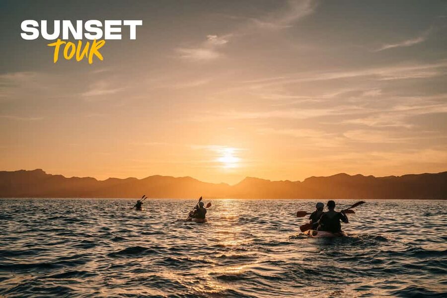 Alcudia: Guided Sea Kayaking Tour with Snorkeling - Sea caves, narrow swims, and rock formations