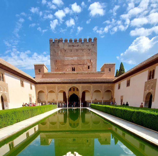 Alhambra and Nasrid Palaces Guided Tour with Tickets - The Alcazaba: walls, towers, and the working side of the city