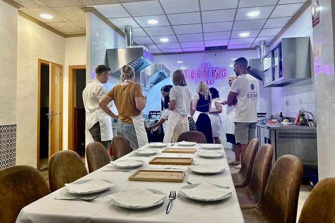 Alicante Paella Cooking Class, Tapas, Drinks and Marketplace - Preparing paella instead of watching a demonstration