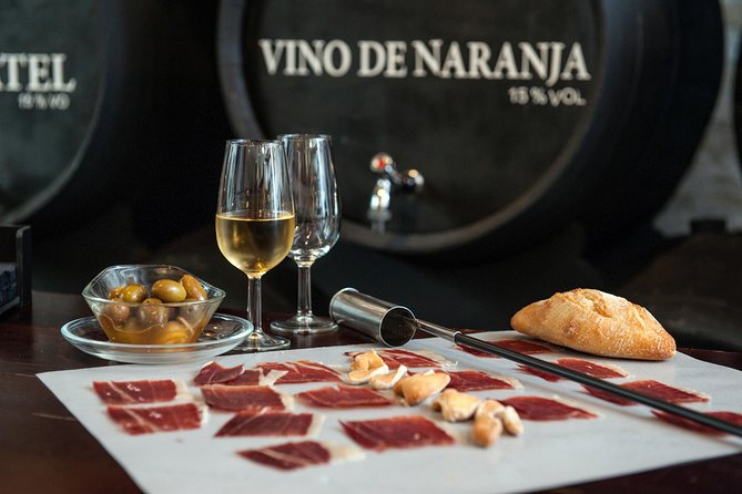 Authentic Flamenco Show with Tapas & Wine Guided Tour - Classic Small Group or Tapas and Flamenco Express?