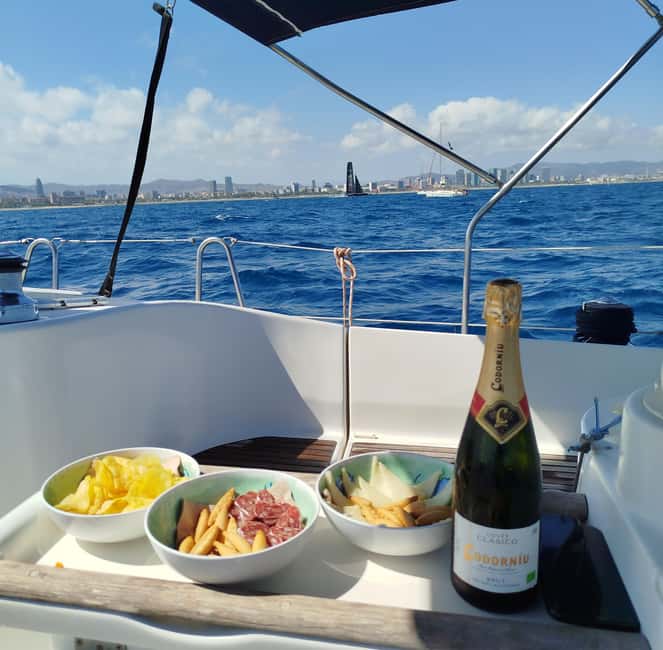 Barcelona Badalona : Sailboat Tour, Snacks, Drinks, Swimming - Quick Takeaways