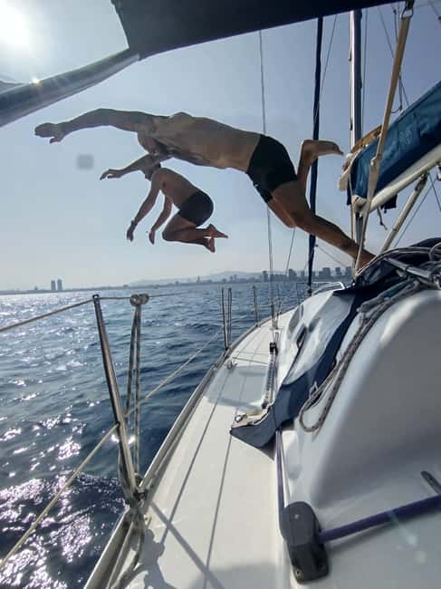 Barcelona Badalona : Sailboat Tour, Snacks, Drinks, Swimming - Swimming and Paddleboarding: The Weather Decides