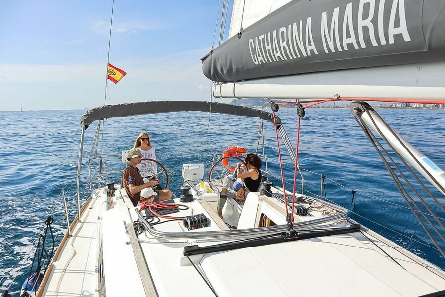 Barcelona: Coastline Boat Trip with Snacks and Cava - Barcelona’s coastline from the open water