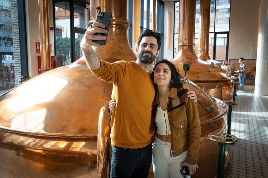 Barcelona: Estrella Damm Old Brewery Tour with Tasting - The first 45 minutes: family stories, machinery, and beer history