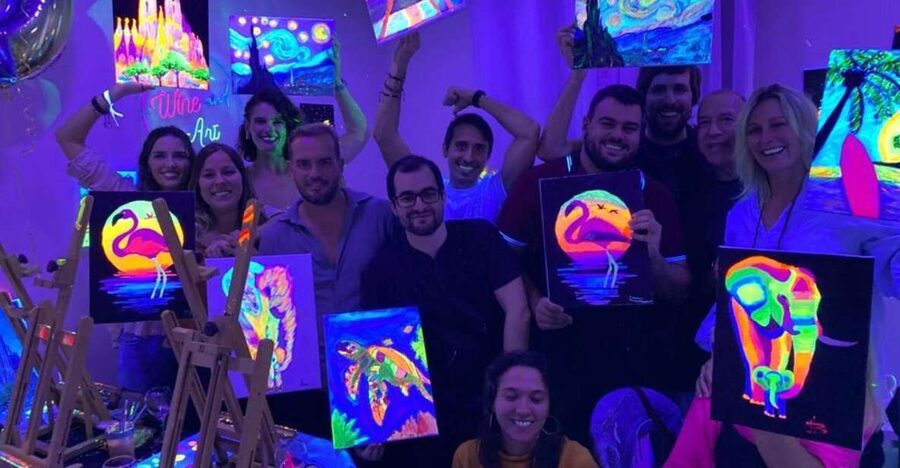Barcelona: Fluorescent Paint and Wine Workshop - Entering the UV-lit studio in Barcelona
