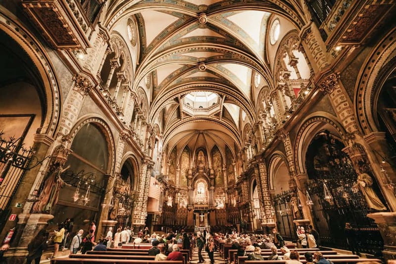 Barcelona: Montserrat and Winery Tour with Tapas or Lunch - The cogwheel train into the mountain