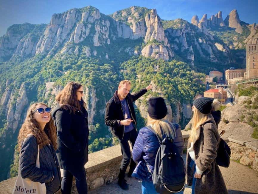 Barcelona: Montserrat Tour with Transport & Basilica Option - The first guided hour at Montserrat Monastery