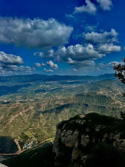 Barcelona: Montserrat Tour with Transport & Basilica Option - Meeting in central Barcelona and riding to the mountain