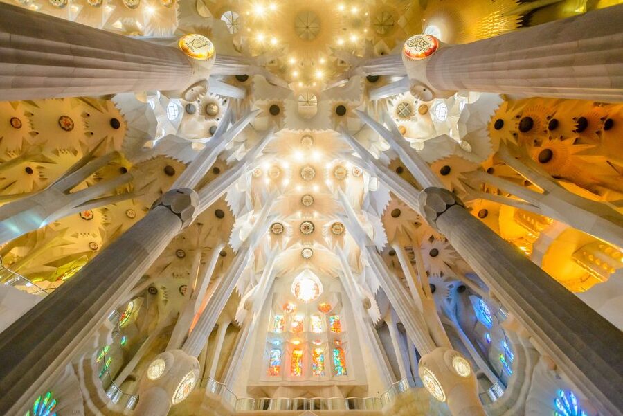 Barcelona: Sagrada Familia Tour & Optional Tower Visit - Inside the basilica: stone, color, and symbols