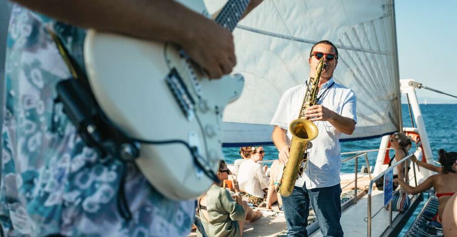 Barcelona: Sunset Catamaran Cruise with Live Music - Boarding Catamaran Orsom