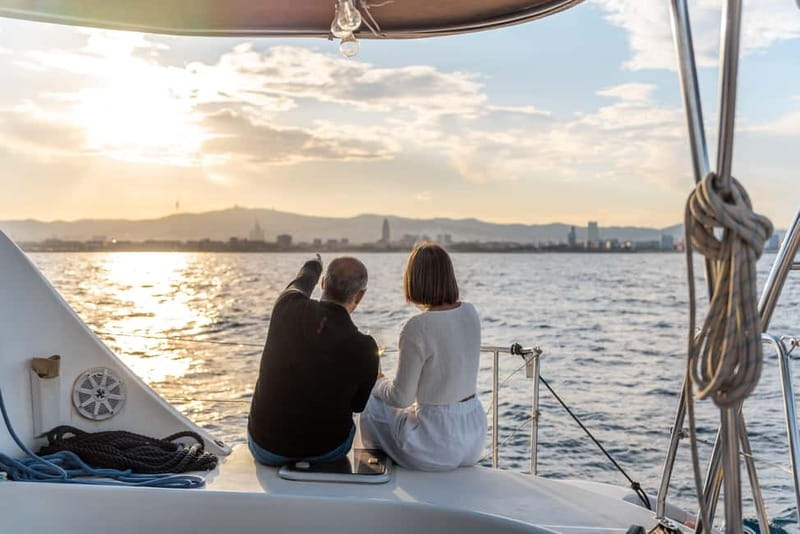 Barcelona: Sunset Catamaran Cruise with Wine and Tapa - What happens during the two-hour cruise