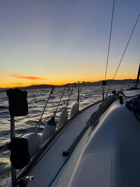 Barcelona: Sunset Sailboat Cruise with Drinks and Snacks - The sunset changes with the calendar