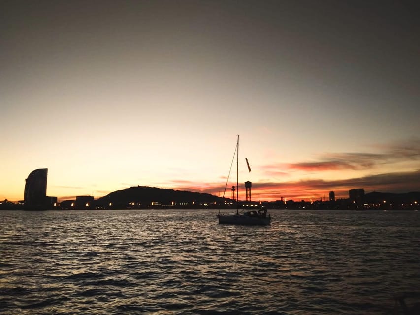 Barcelona: Unique Sunset Sailing Tour with Tapas & Open Bar - Watching Barcelona turn gold
