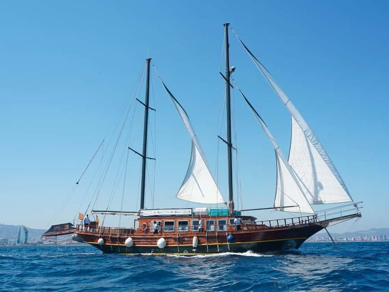 Barcelona: Wooden Boat Sailing with Tapa and Welcome Drink - The 90-minute route along the coast