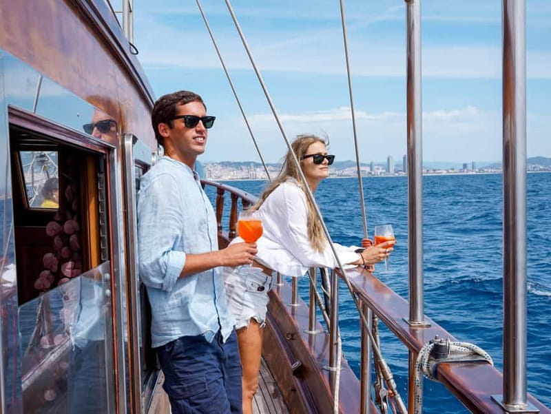 Barcelona: Wooden Boat Sailing with Tapa and Welcome Drink - Weather, comfort, and practical preparation