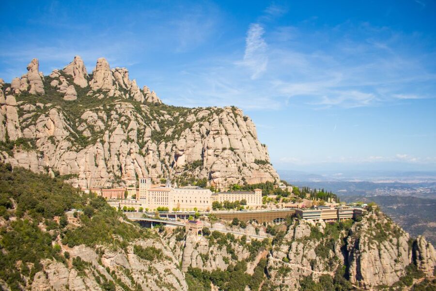 From Barcelona: Half-Day Montserrat Experience - Meeting the guide near Arc de Triomf