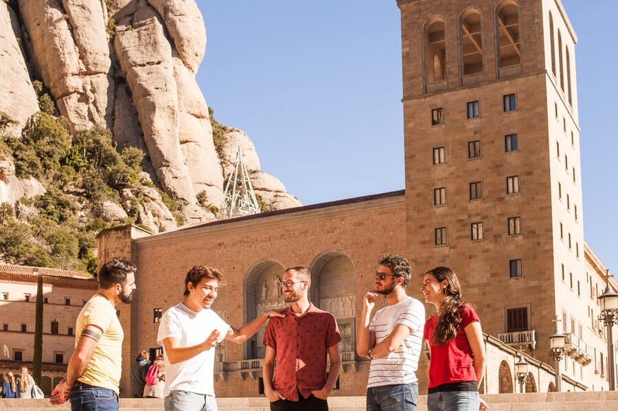 From Barcelona: Montserrat Half-Day Wine and Tapas Trip - Reaching the Benedictine monastery