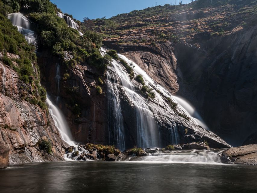 From Santiago: Finisterre, Muxia & Costa da Morte Excursion - Ezaro Waterfall: water running straight to the sea