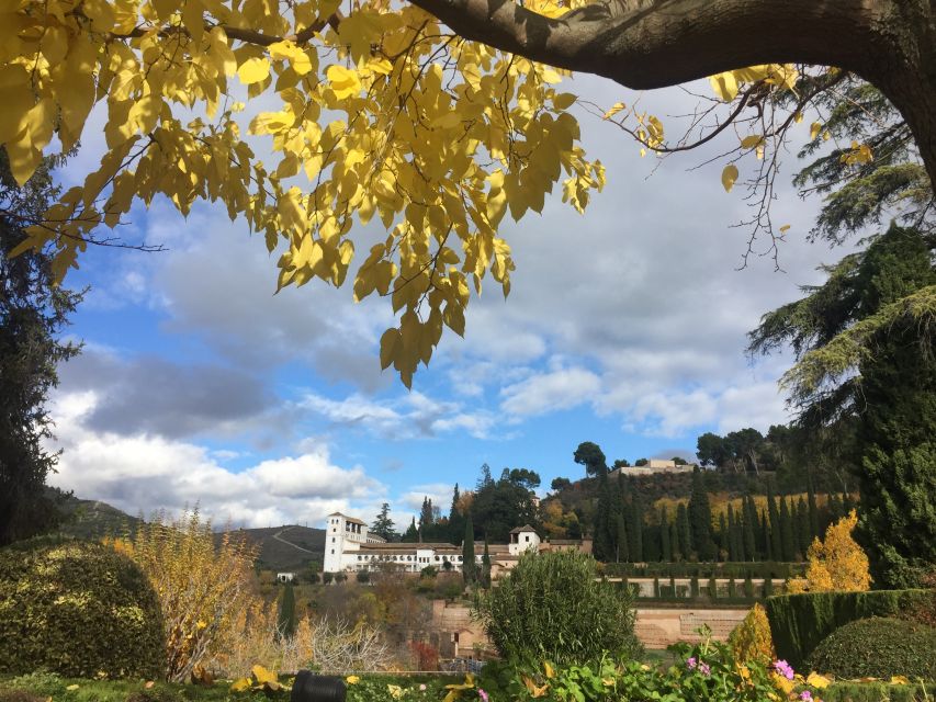 Granada: Alhambra & Generalife Fast-Track Guided Tour - Alcazaba Towers and Views Over Granada