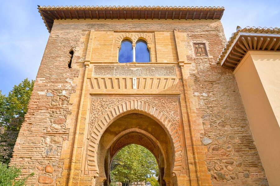 Granada: Alhambra Small Group Tour with Nasrid Palaces - Carlos V Palace: a sharp change in architectural style