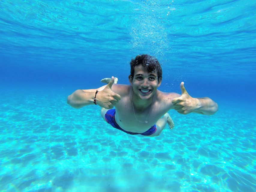 Ibiza: Sea Caves & Coves Snorkeling Paddle Boarding Tour - First stop: sea caves and clear water