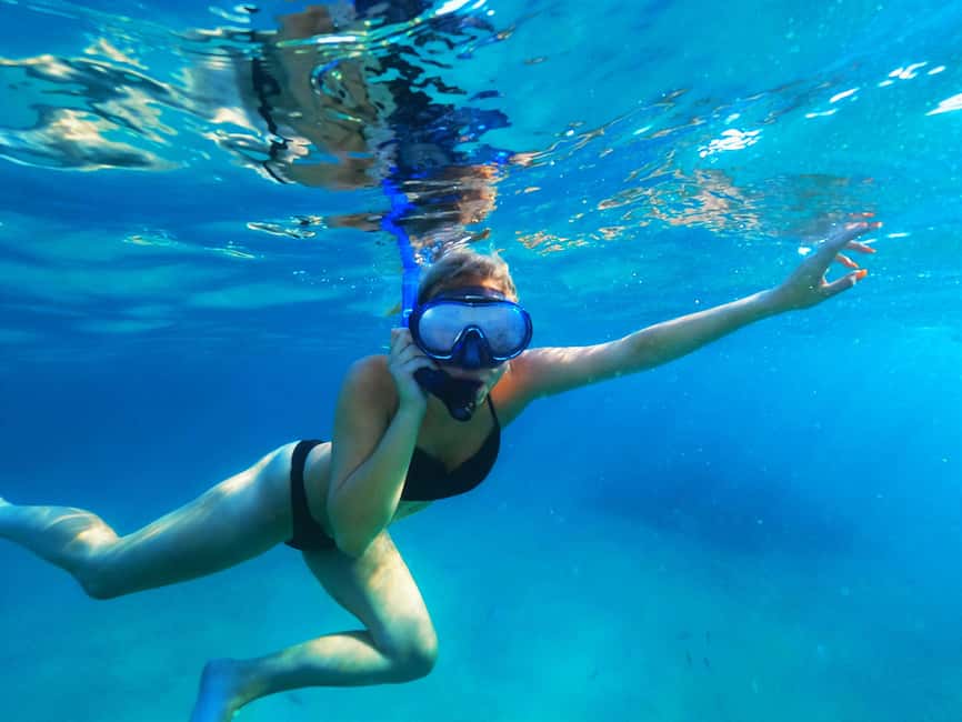 Ibiza: Snorkeling and SUP Paddle, Beach and Cave Boat Tour - Cala Conta: clear water and a first chance to paddle