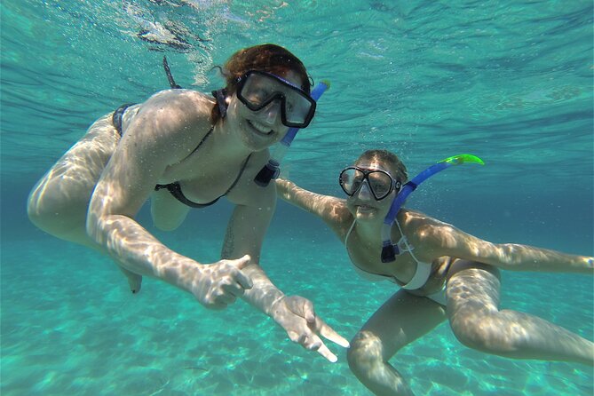 Ibiza Snorkeling Beach and Cave Tour - Drinks, music, and the onboard mood