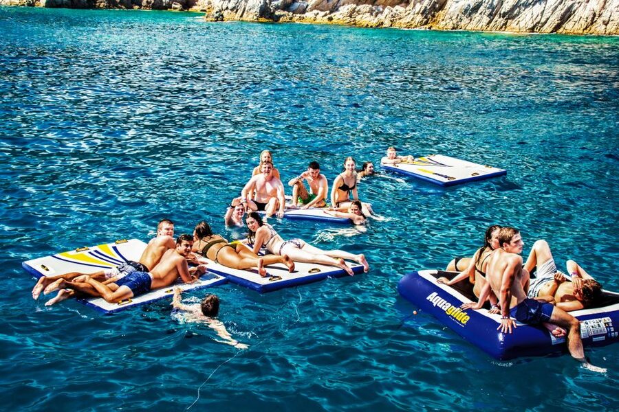 Lloret de Mar: Catamaran Sailing Cruise with BBQ and Drinks - From Lloret beach to the open Costa Brava