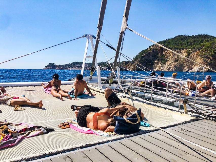 Lloret de Mar: Catamaran Sailing Cruise with BBQ and Drinks - Two hours at anchor for swimming and snorkeling