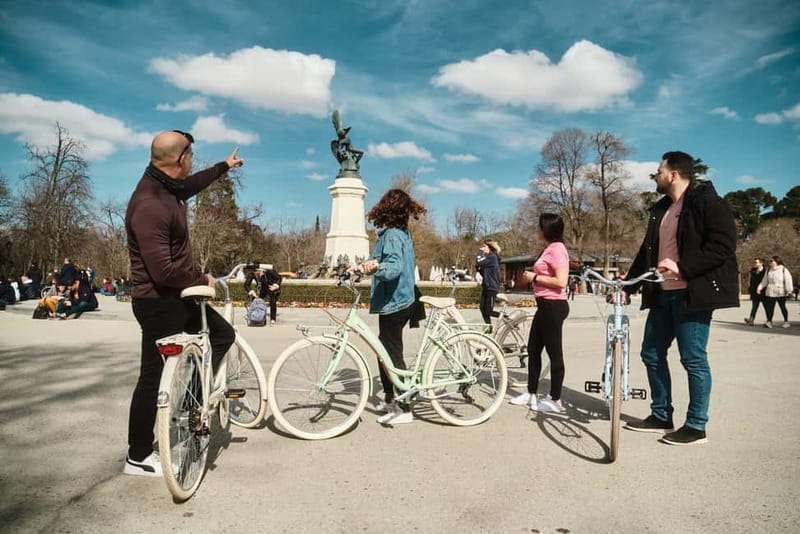 Madrid: Highlights Guided Vintage Bike Tour and Tapas Option - Retiro Park gives the ride room to breathe