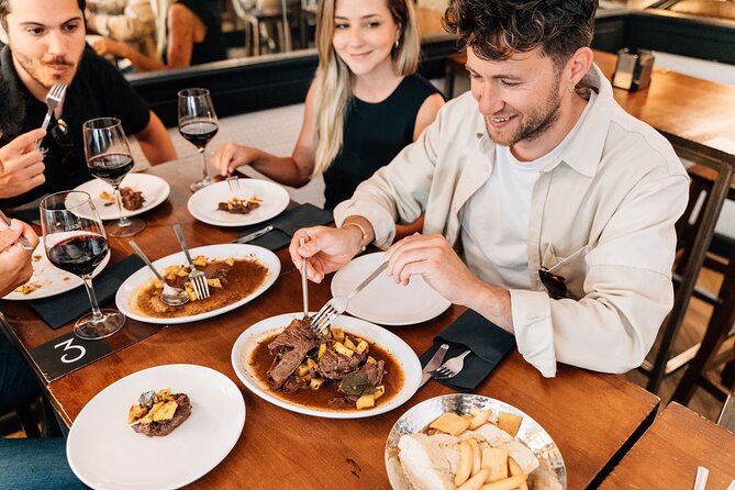 Madrid Tapas & Wine Tour with Rooftop Views and Local Guide - The Gran Vía rooftop finish