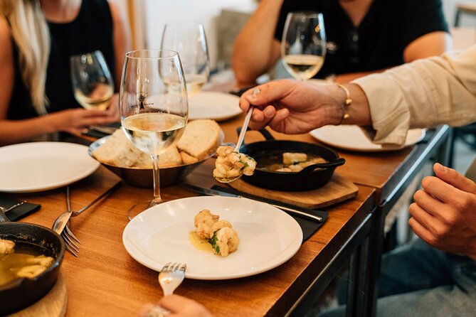 Madrid Tapas & Wine Tour with Rooftop Views and Local Guide - Walking, timing, and meeting details