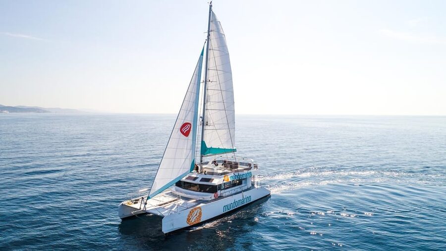 Malaga: Catamaran Sailing Cruise with Swimming & Optional DJ - Leaving Malaga’s pier for a sea-level view