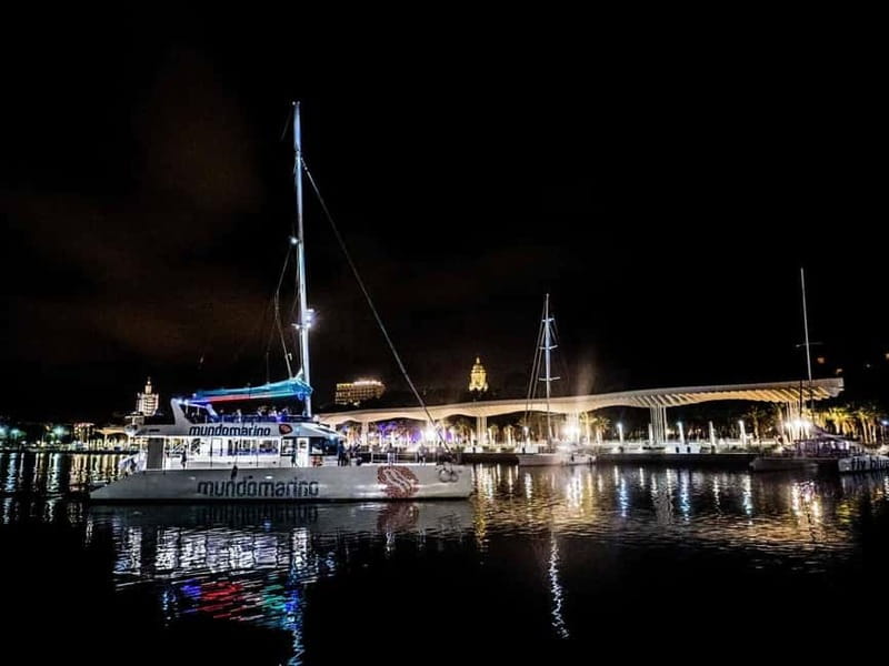Malaga: Sailing Catamaran Sunset Cruise with Live DJ & Drink - What the Crew Does, and What It Does Not Do