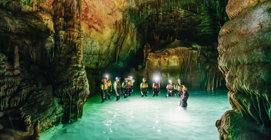 Mallorca: Cova des Coloms Caving Trip with Hotel Transfer - Reaching the entrance by sea