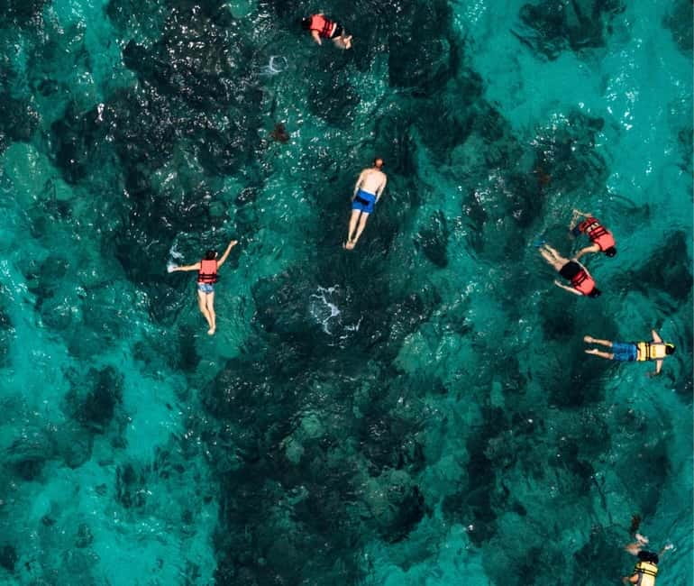 Mallorca: Palma Boat Tour & Snorkeling with Drink Included - Music, drinks, and the social side