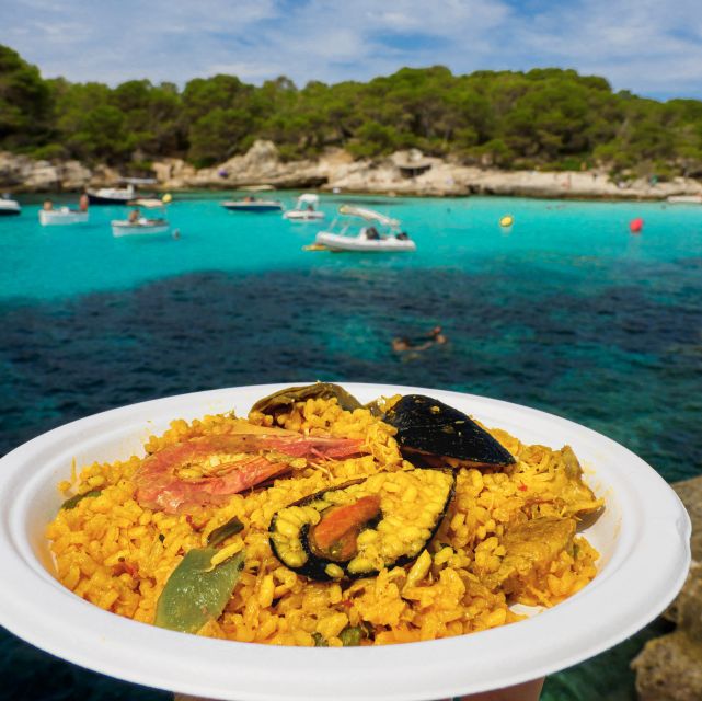 Menorca: Full-Day Boat Tour with Paella Lunch - Cala en Turqueta: two hours for swimming and sand