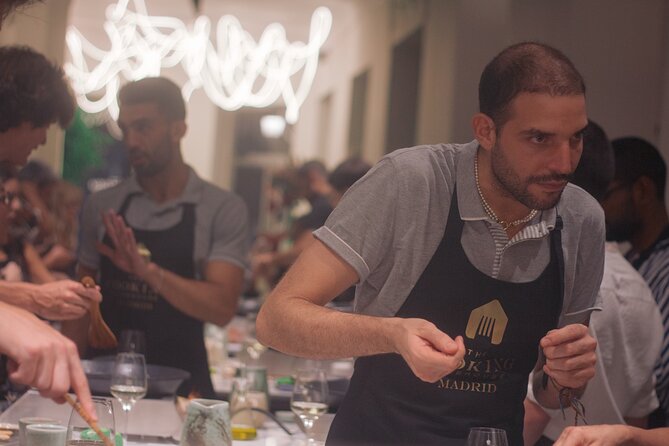 Paella Cooking Class in Madrid with Bottomless Wine Pairing - The shared paella tasting is the social centerpiece