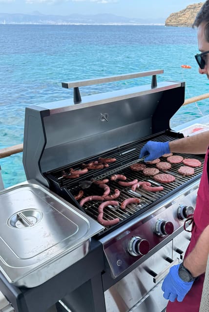 Palma Bay: Boat Tour with BBQ, Snorkelling, & Sunset Option - BBQ, fruit, and one drink on board