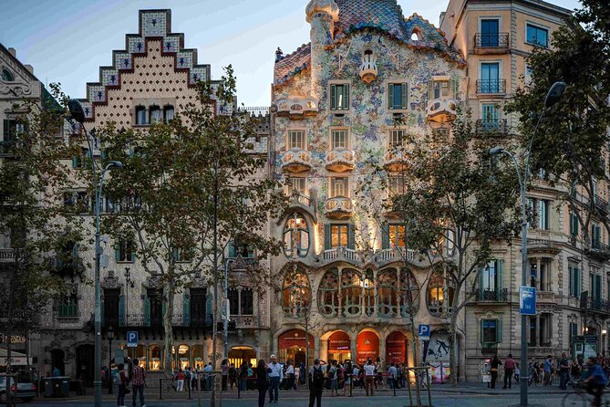 Sagrada Familia & Barcelona Small Group Tour with Hotel Pick-up - Roman columns in a medieval courtyard