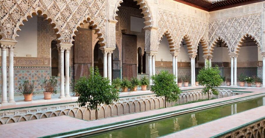 Seville: Alcázar, Cathedral & Giralda Fast Track Guided Tour - The Alcázar: tiled rooms, royal power, and garden time