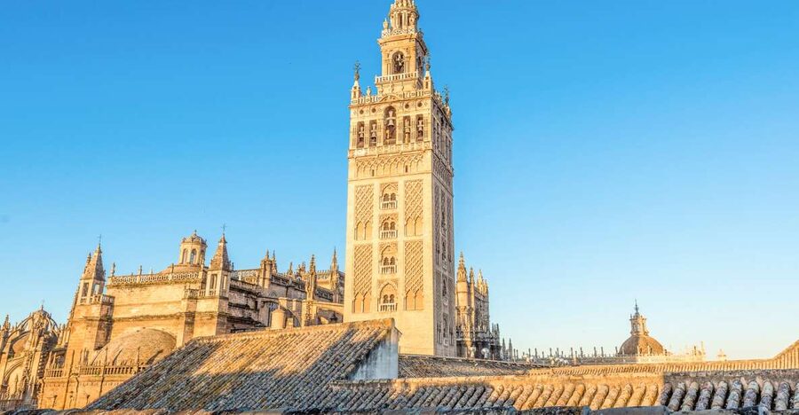 Seville Cathedral and Giralda Tower Guided Tour and Tickets - Entering through the office on Calle Hernando Colón