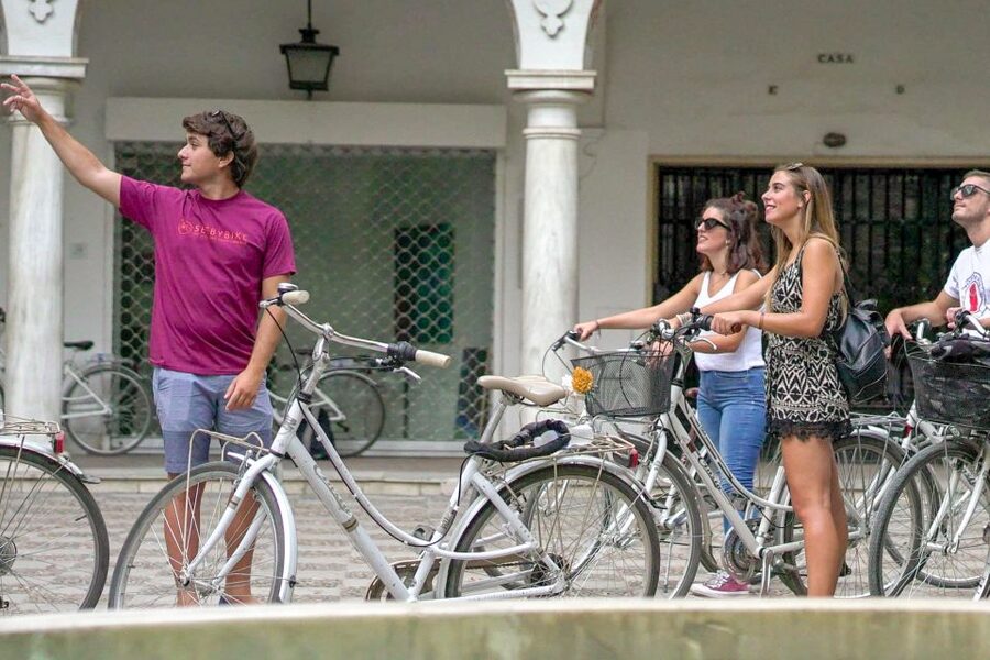 Seville: City Sightseeing and Local Culture Bike Tour - What the guides add to the ride