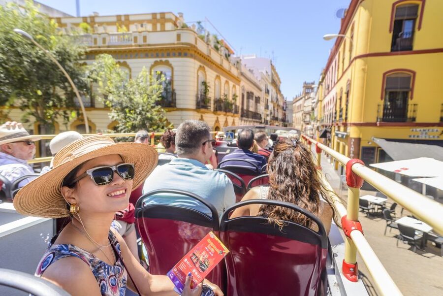 Seville: City Sightseeing Hop-On Hop-Off Bus Tour - Stops 6 to 8, crossing into Triana and the Expo area