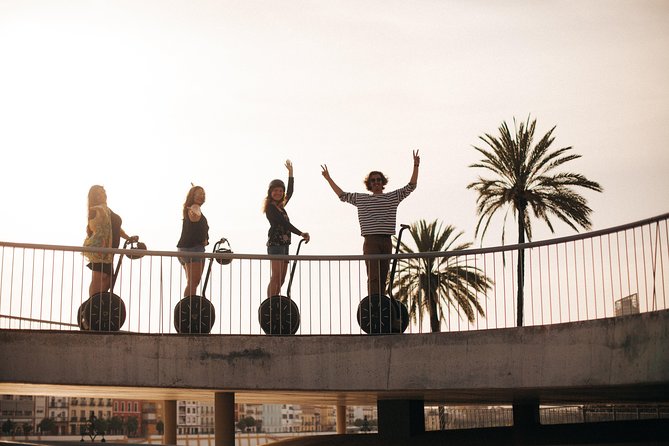 Seville City Tour 2 Hour Monumental Segway Tour - Crossing Triana Bridge and entering Triana