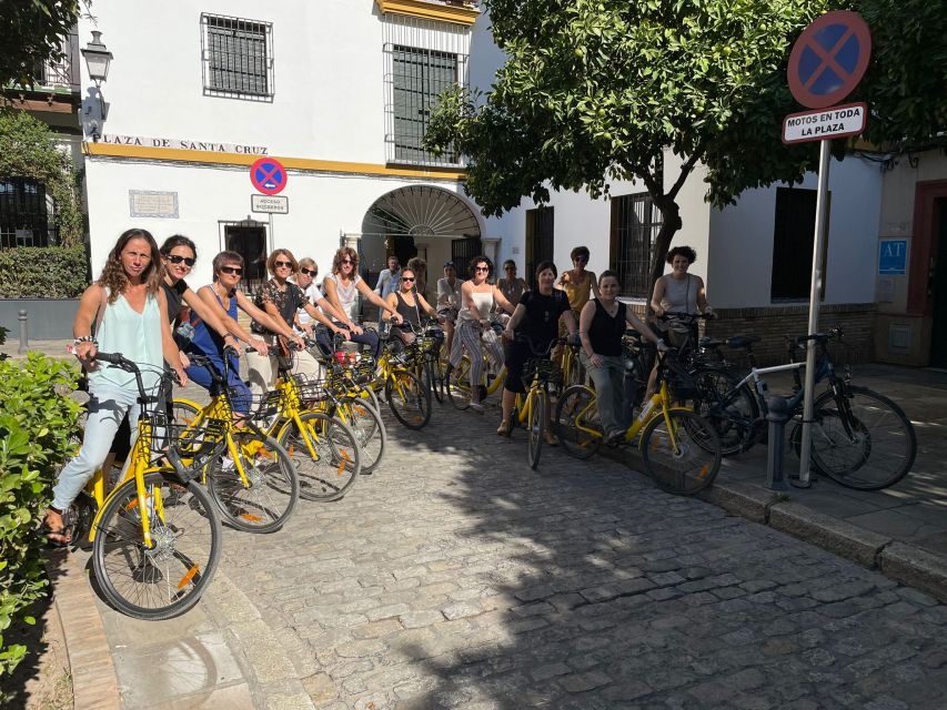 Seville: Relaxing City Bike Tour with a Tour Guide - Crossing into Triana