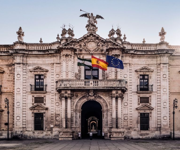 Seville: Small-Group City Highlights Walking Tour - Torre del Oro beside the river