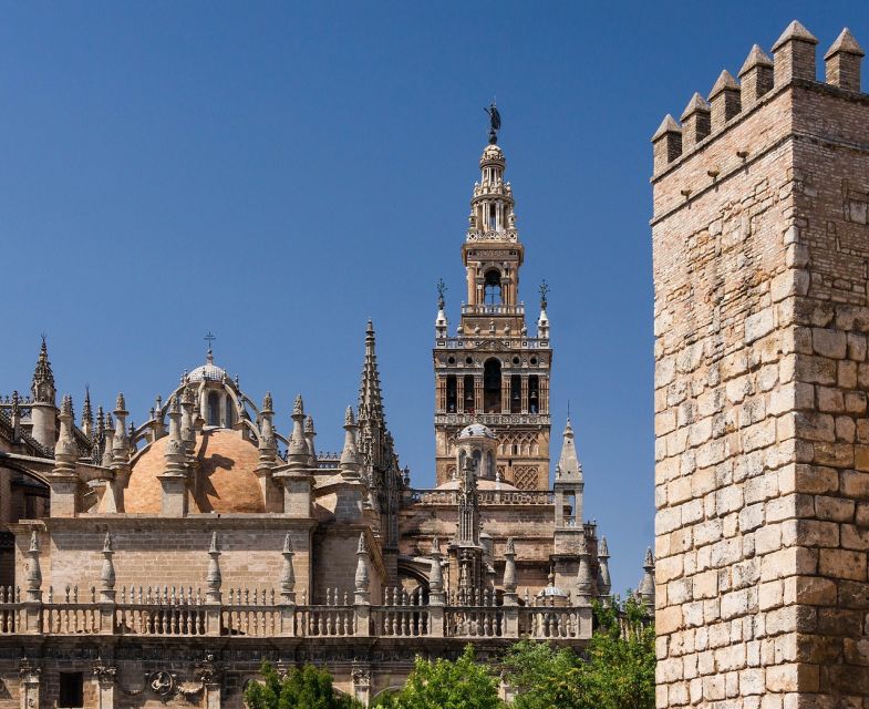 Seville: Small-Group City Highlights Walking Tour - María Luisa Park and the approach to Plaza de España