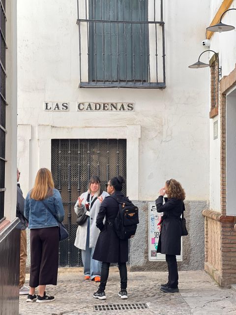 Seville: Small Group Jewish Quarter Tour with Tapas & Drinks - Calle Agua, the palace wall, and old water pipes