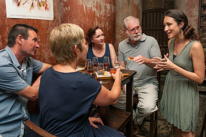 Ultimate Seville Tapas, Wine & History Small Group Tour - Sitting down at Bodeguita Antonio Romero